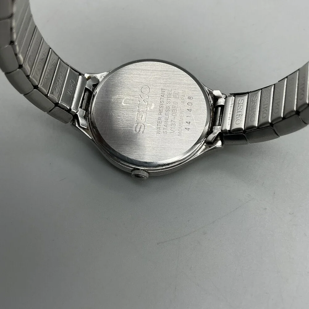 Seiko Solar Womens Watch 28mm Black Dial Silver Tone Stainless Stretch Bracelet